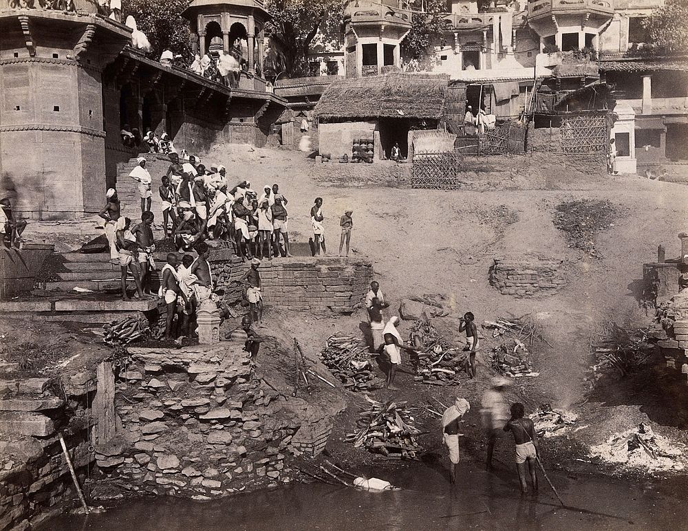 Benares (Varanasi), Uttar Pradesh: corpses being burned and consigned to the river Ganges. Photograph.