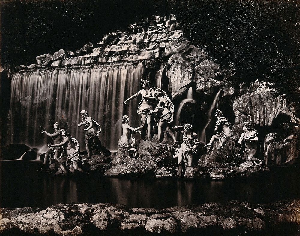Caserta Royal Palace, Naples, Italy: Diana with her nymphs: sculptures in front of a waterfall in the palace gardens.…