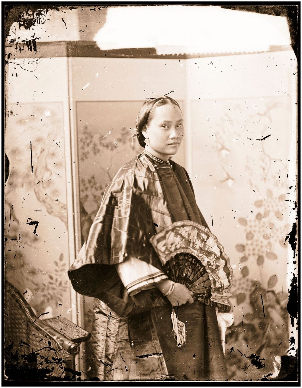 Canton, Kwangtung (Guangdong) province, China: a young woman. Photograph by John Thomson, 1869.
