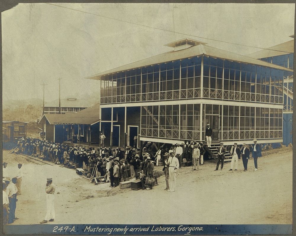 Panama Canal construction workers on arrival at the train station, Gorgona. Photograph, ca. 1910.