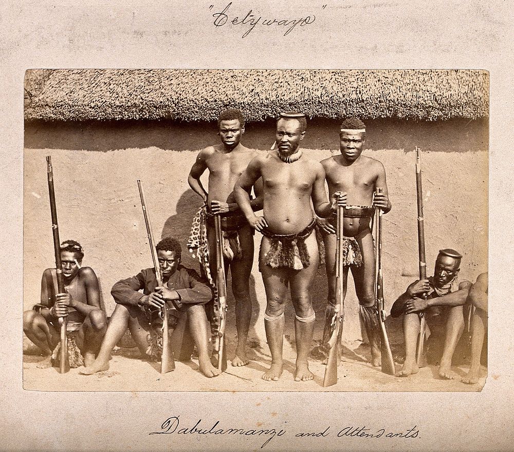 South Africa: a group of Zulu men with rifles. Albumen print.