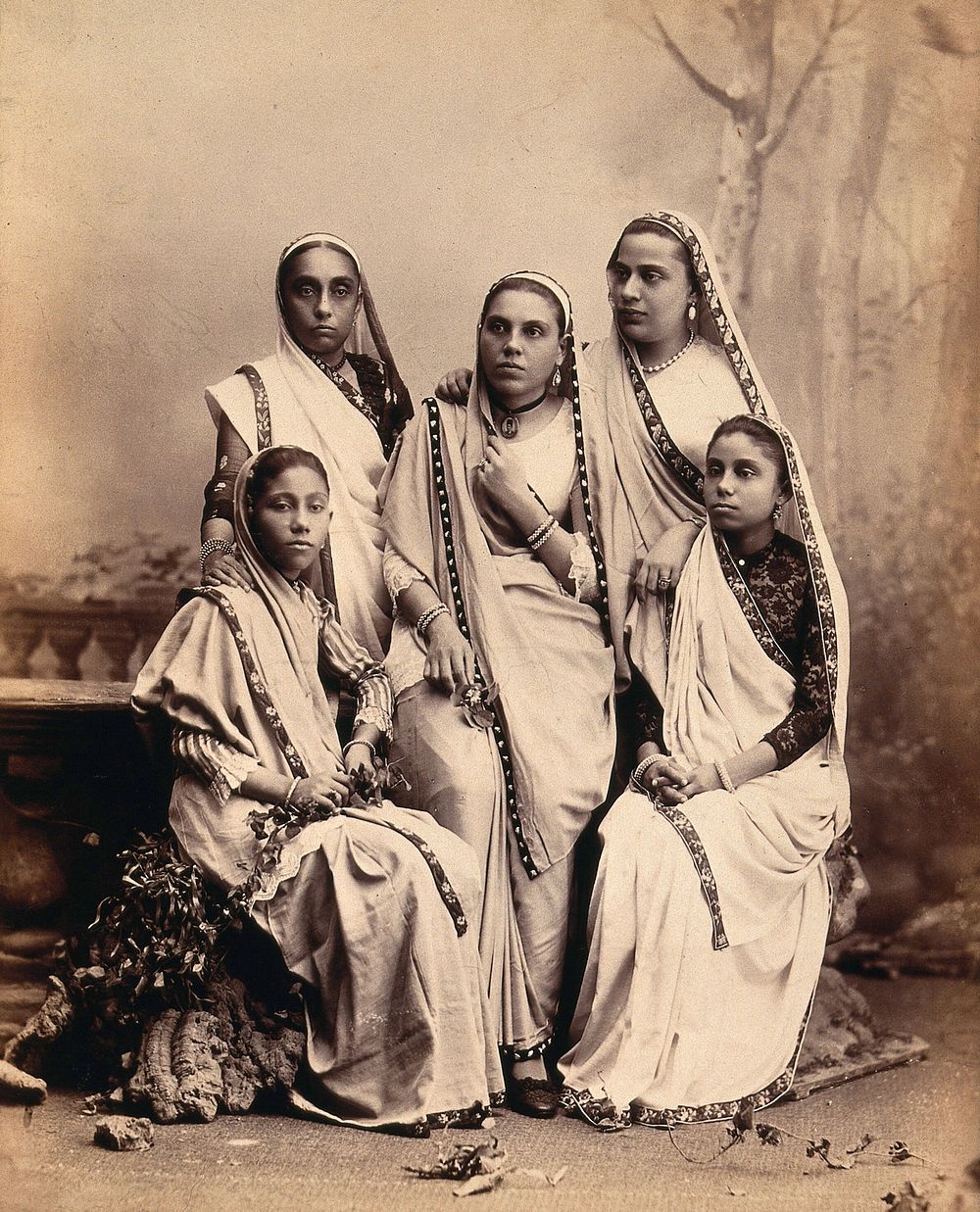 Parsee women wearing saris: group portrait. Photograph, ca. 1900.