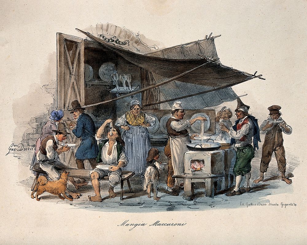 A man is cooking macaroni under a large awning in the street, his customers are sitting on benches enjoying their food.…