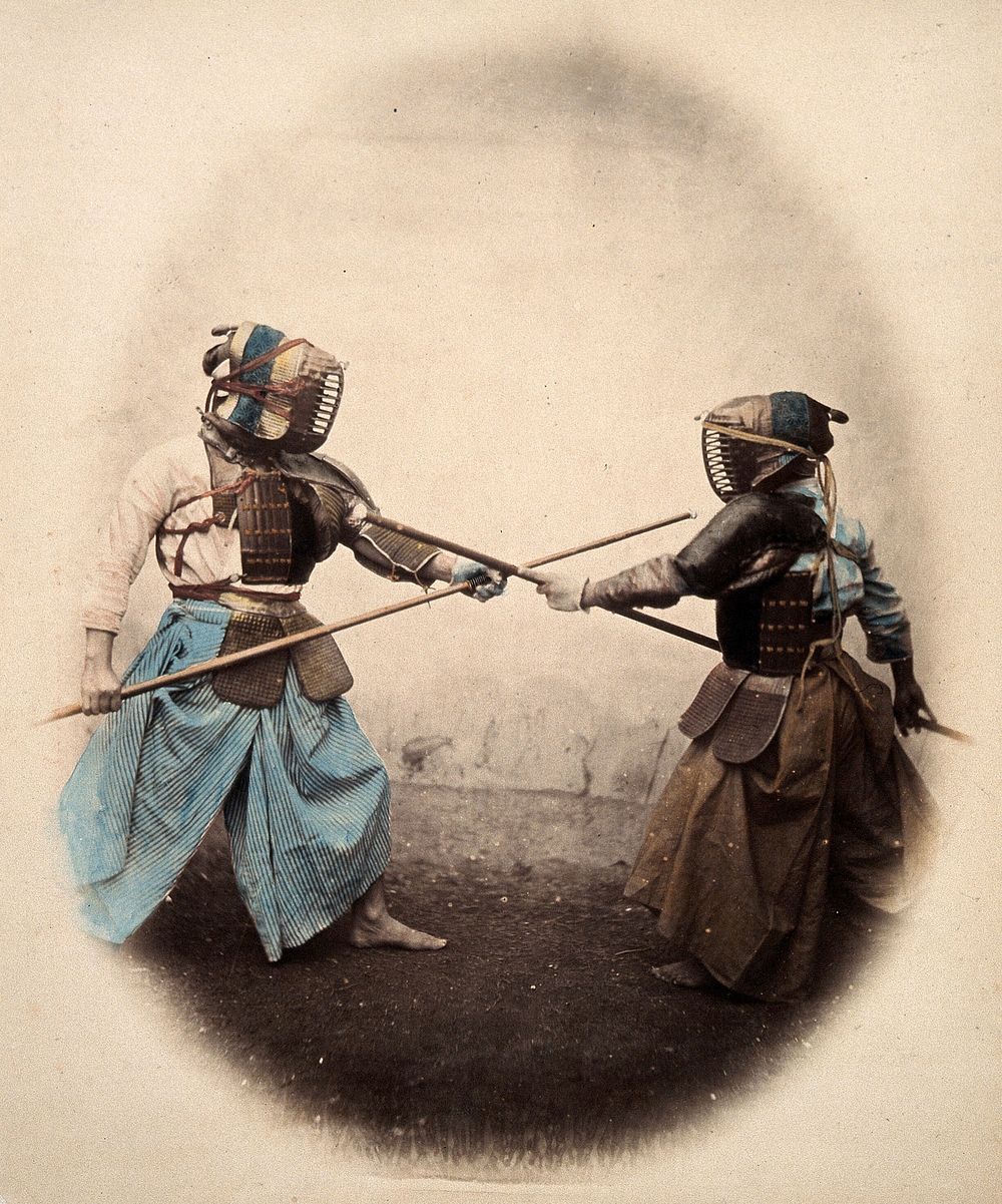 Japan: spear-men wearing protective clothing and masks. Coloured photograph by Felice Beato, ca. 1868.