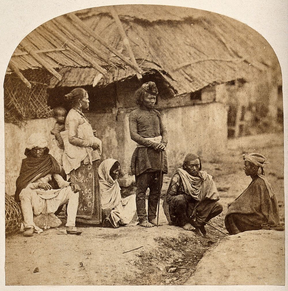 Nepal: Sunwar people outside a dwelling. Photograph by Clarence Comyn Taylor, ca. 1860.