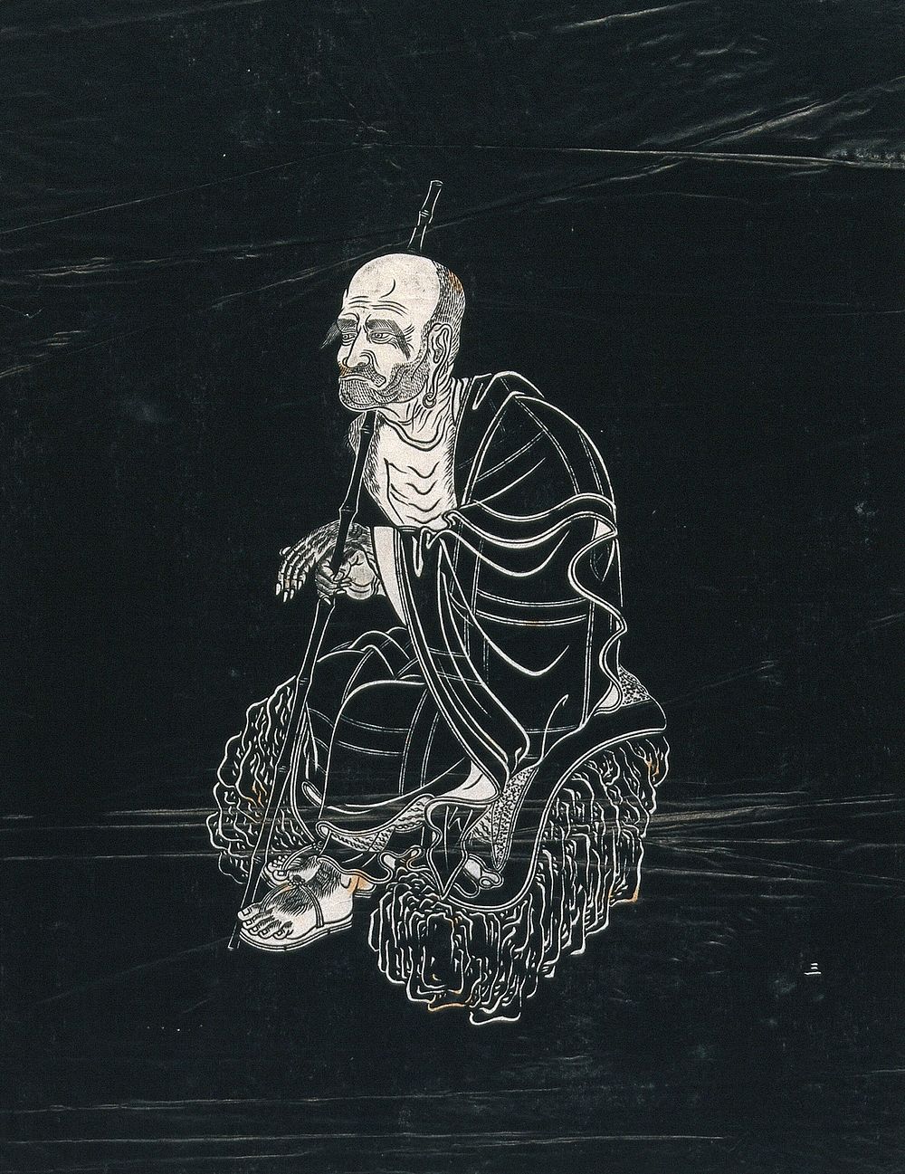 A Lohan (disciple of Buddha), seated on a rock holding a staff. Woodcut in the manner of an ink stone rubbing, China, 18--.