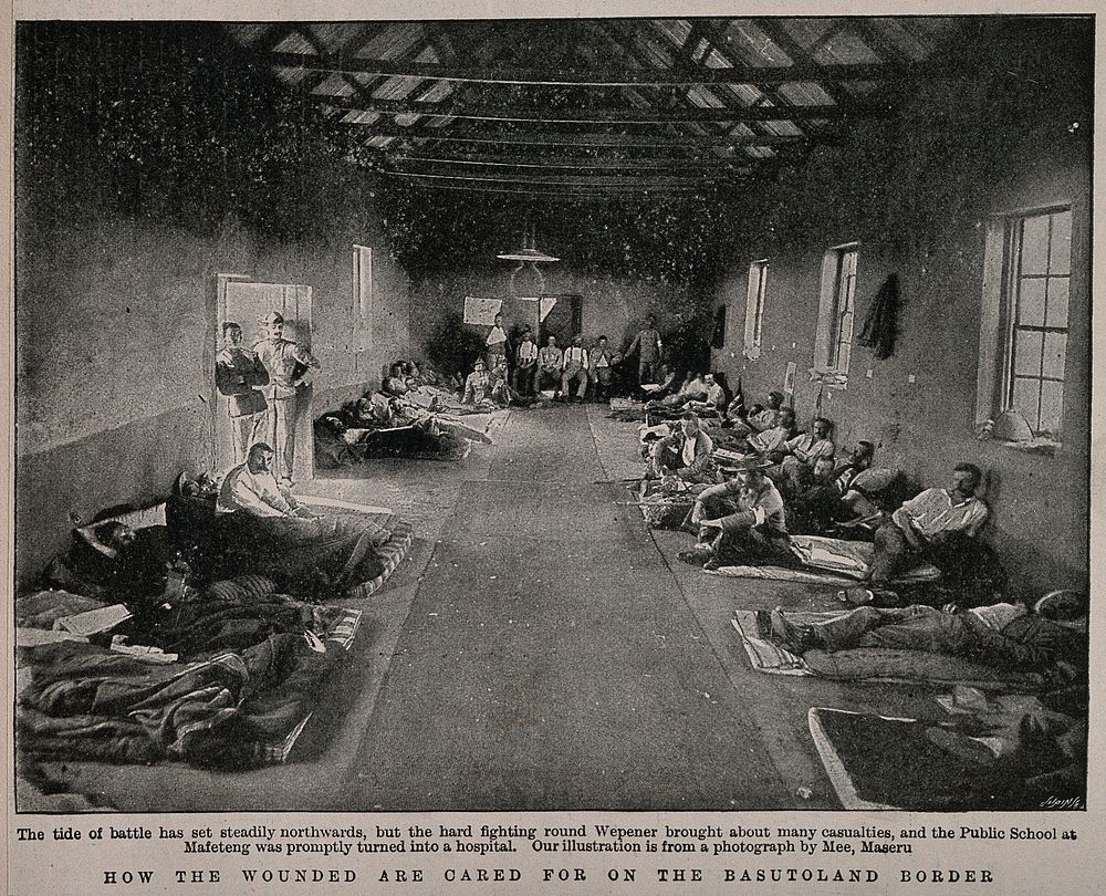 Boer War: men lying in a military hospital housed in a public school at Mafeteng, South Africa. Halftone, c.1900, after M.…