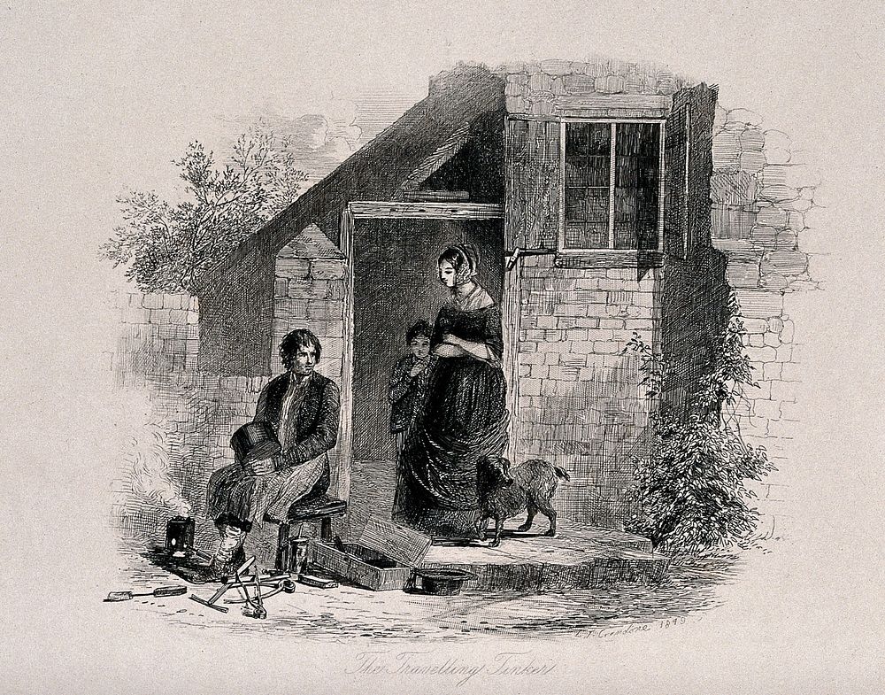 A man sits on a stool in front of a small brazier with tools and boxes lying on the ground and a woman and child with a dog…