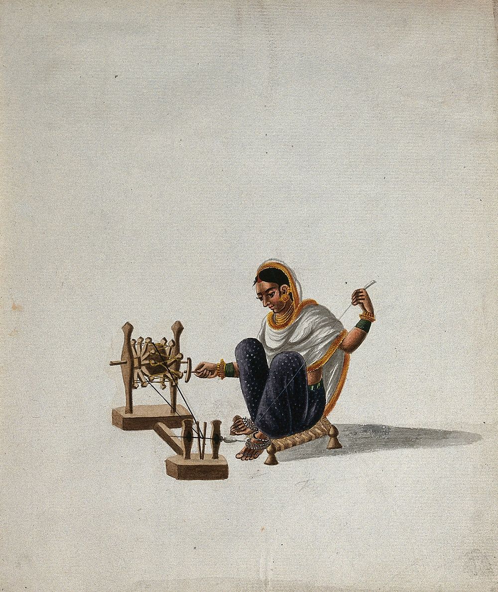 A woman sitting on a low stool and spinning thread. Gouache painting by an Indian artist.