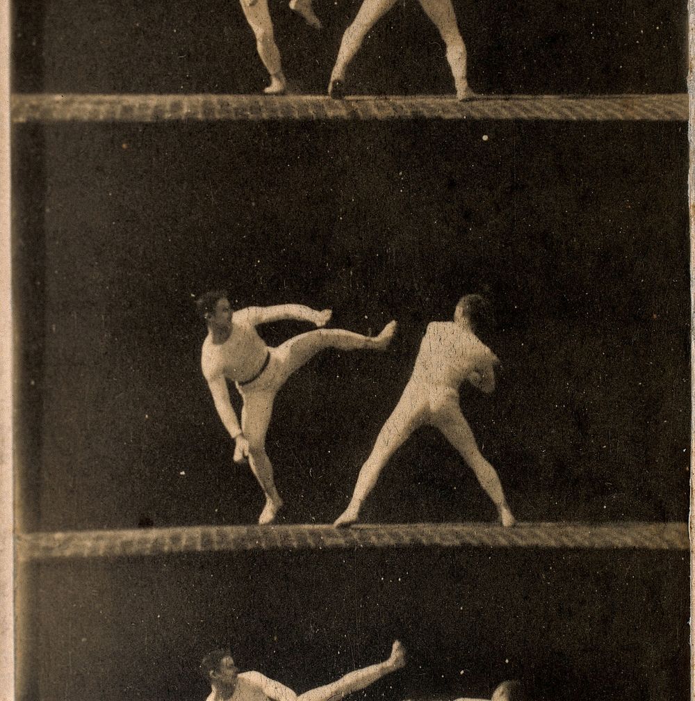 Two men dressed in white, wrestling, sequences. Photograph.