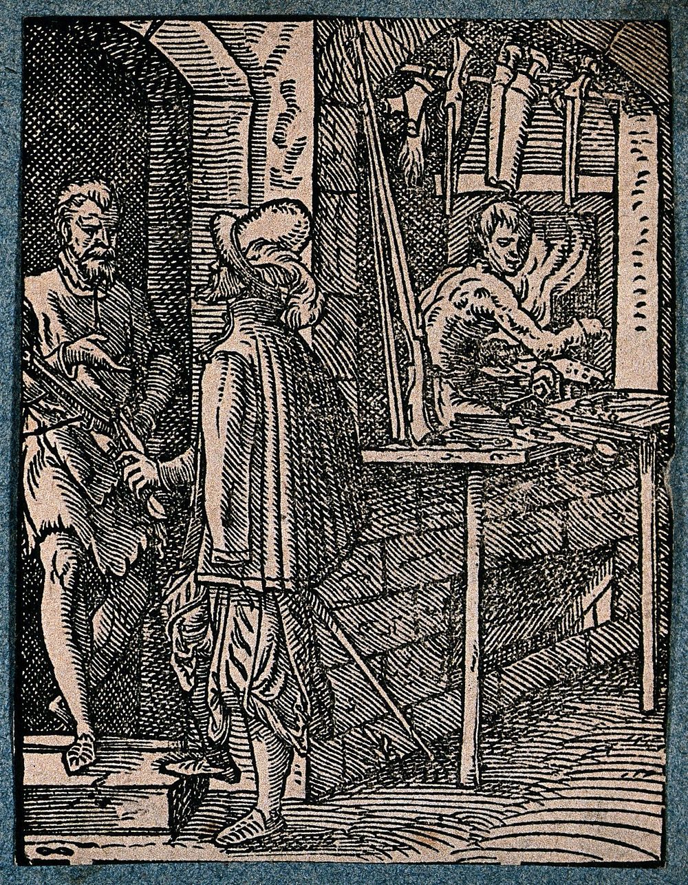 A gunsmith's shop: a customer talks to the gunsmith, while an assistant works metal in a furnace. Woodcut by J. Amman.