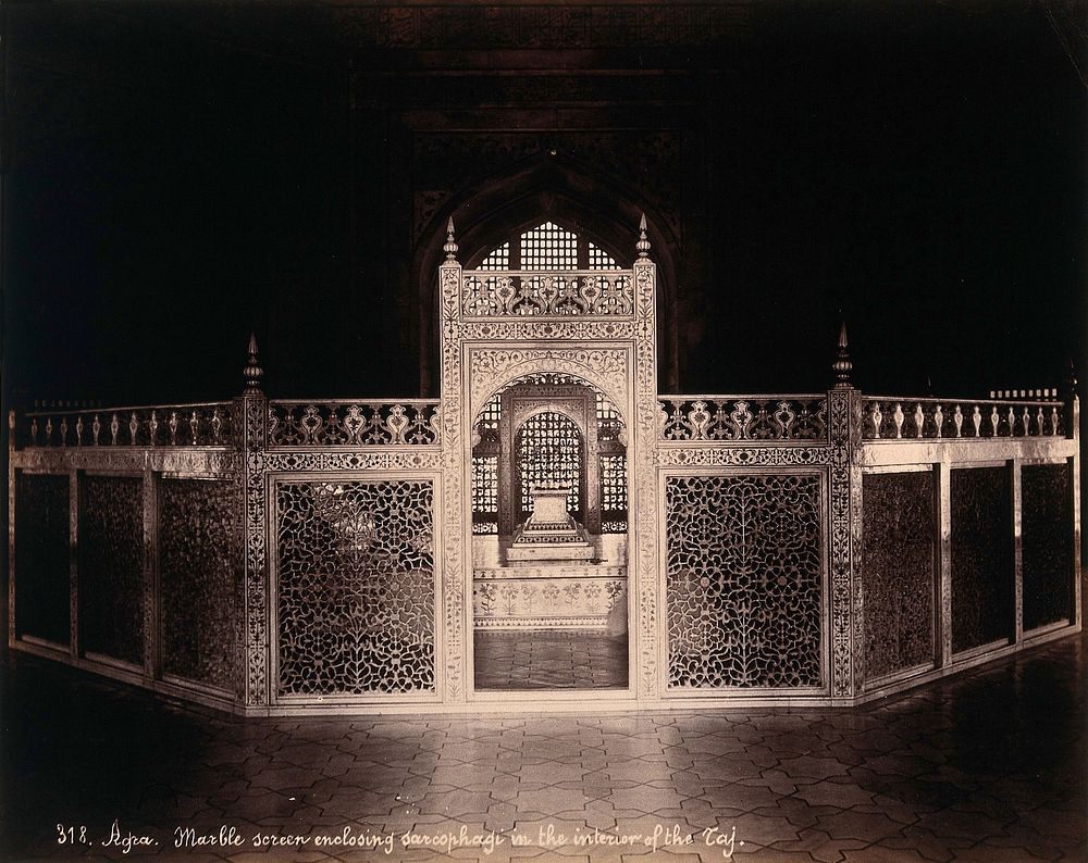 The Taj Mahal, Agra: interior: decorative marble screen enclosing the sarcophagi of Mumtaz Mahal and Shah Jehan. Photograph…