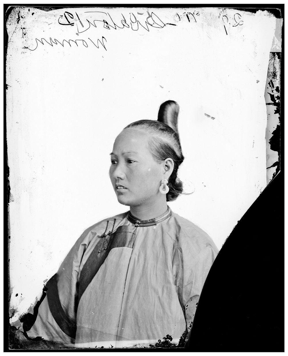 Shantou (Swatow), Guangdong (Kwangtung) province, China: a woman with prominent coiffure. Photograph by John Thomson, 1871.