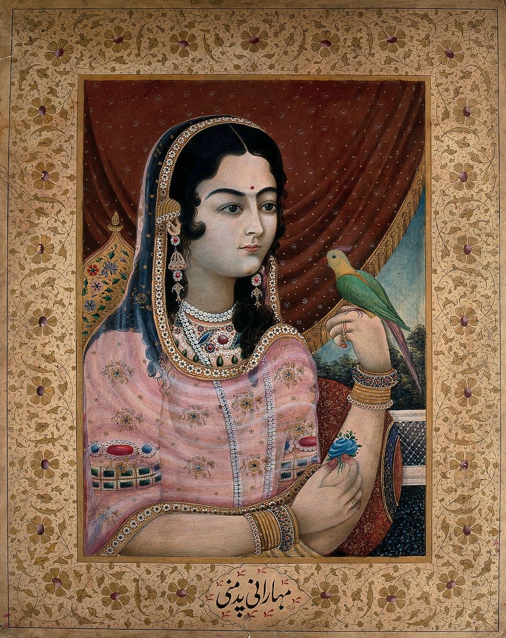 A Mughal courtesan or member of a Mughal royal family looking at a parrot perched on her hand. Gouache painting by an Indian…