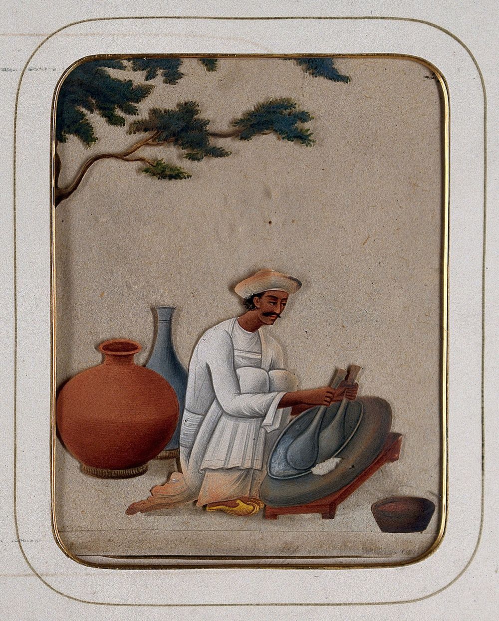A man pounding  with pestle type equipment in both hands. Gouache painting on mica by an Indian artist.