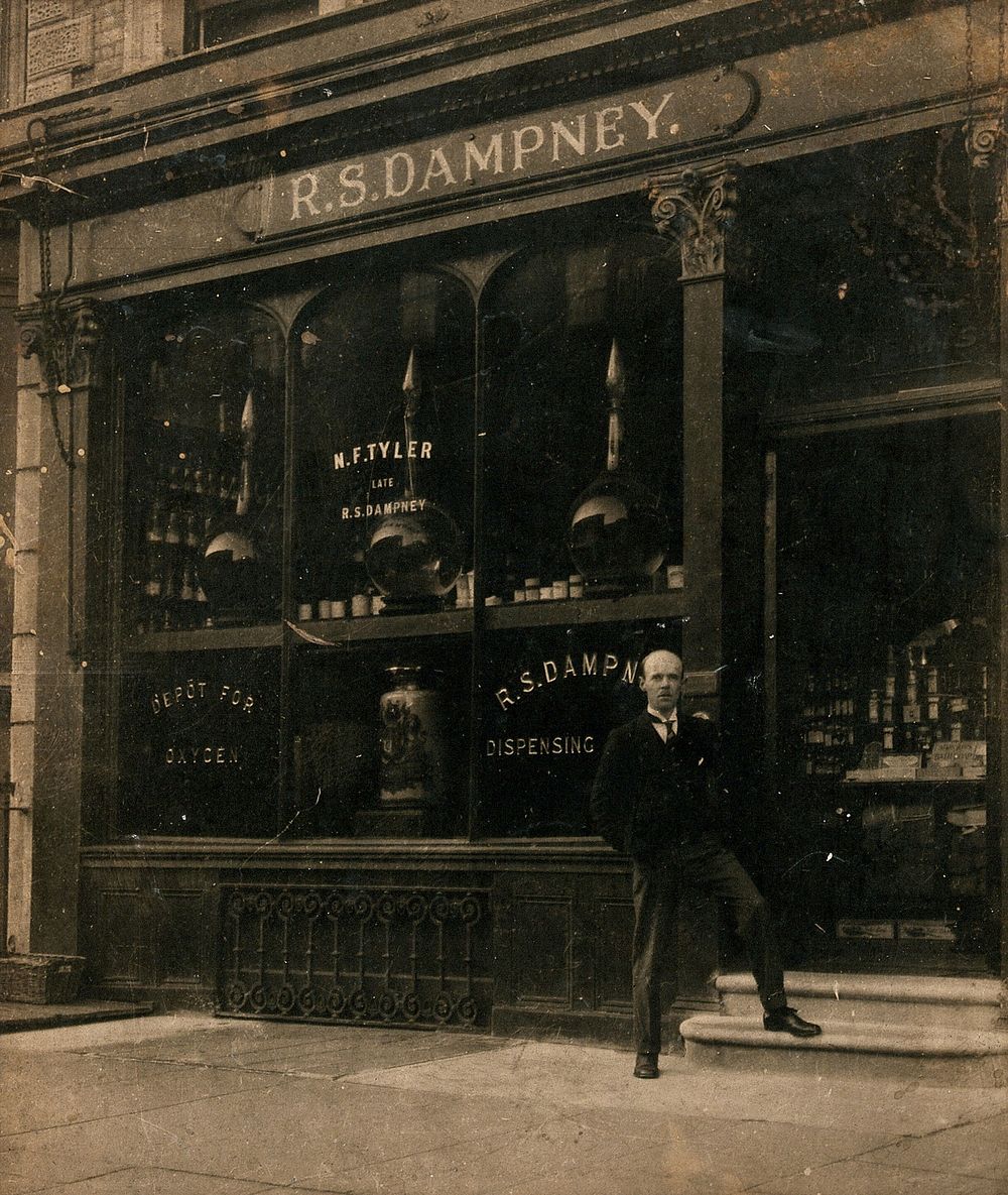 The R. S. Dampney dispensary, with (the chemist ) standing outside. Photograph, 1880/1900.
