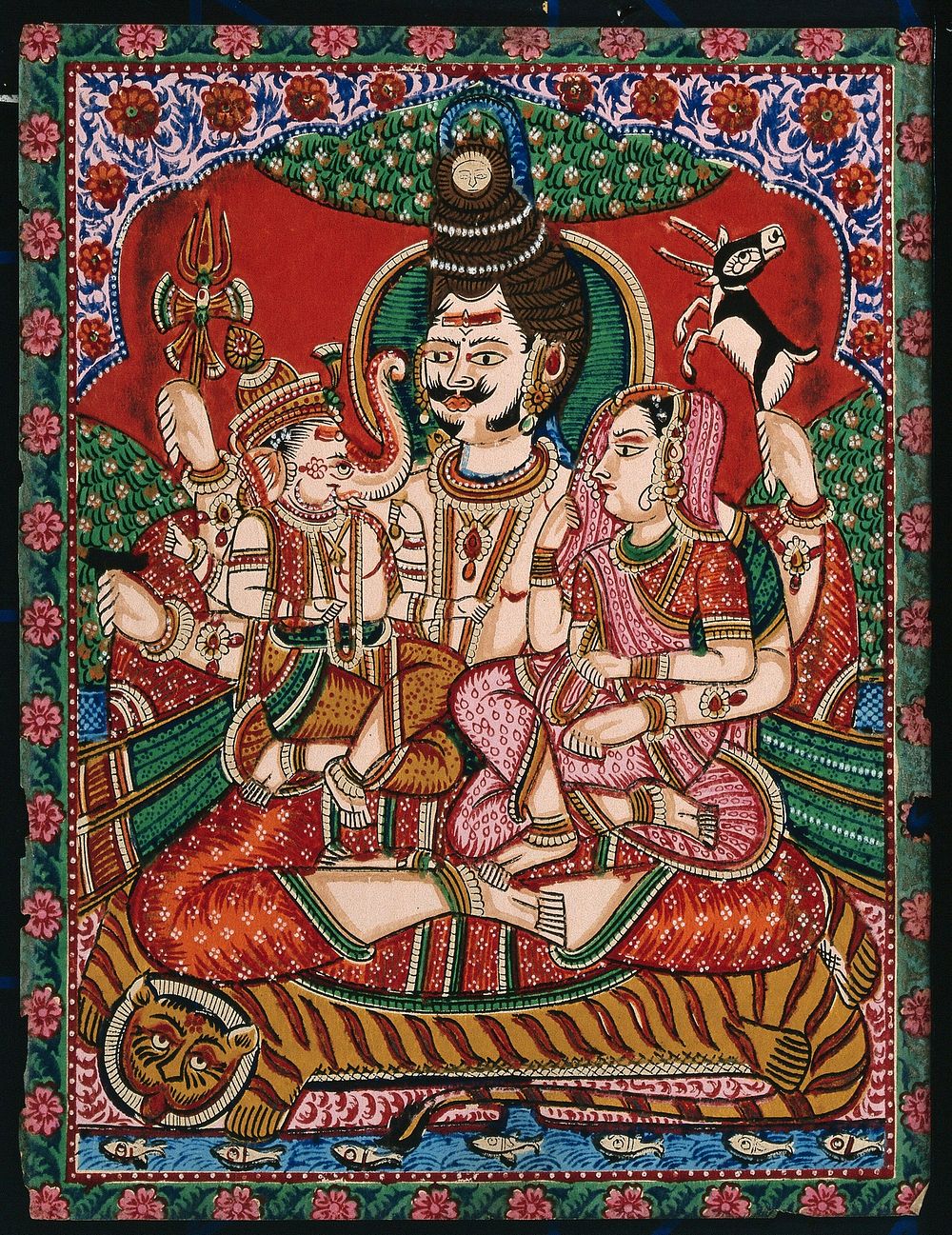 Shiva sitting on a tiger skin with his wife, Parvati and their son Ganesha on his lap. Gouache painting by an Indian painter.