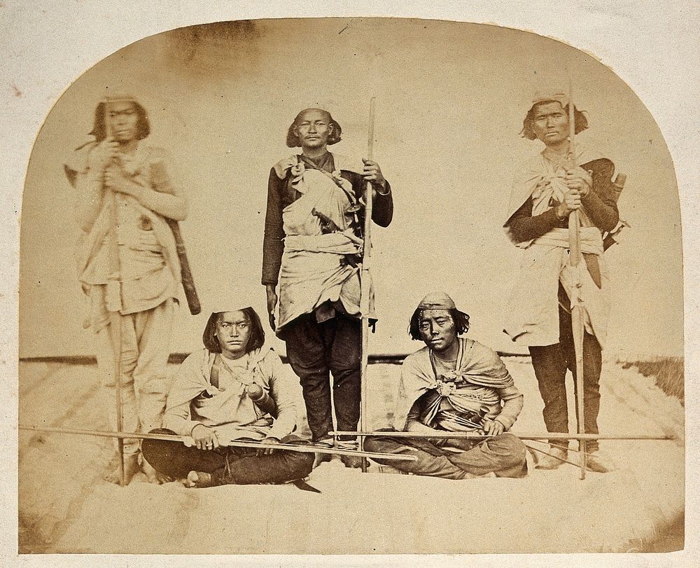 Nepal: people bearing sticks: group portrait. Photograph by Clarence Comyn Taylor, ca. 1860.