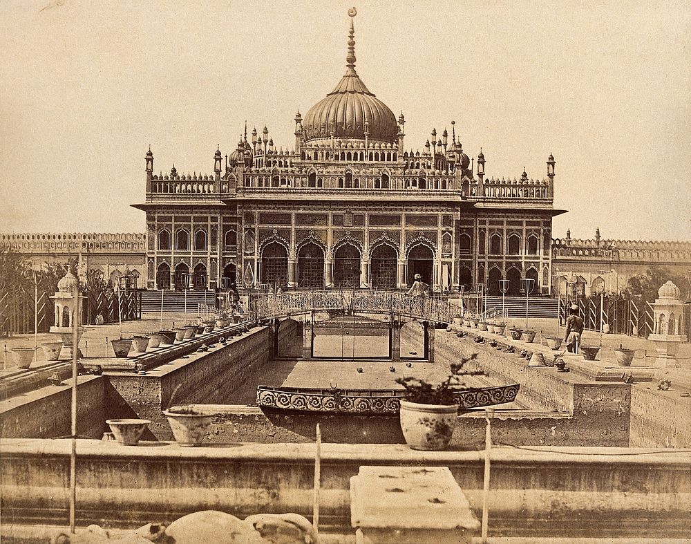 Lucknow, India: a large emambara with an ornate facade and a domed roof. Photograph by Felice Beato, 1858.