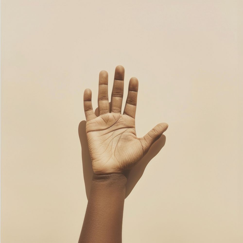 The right palm print of a person on paper finger hand studio shot.