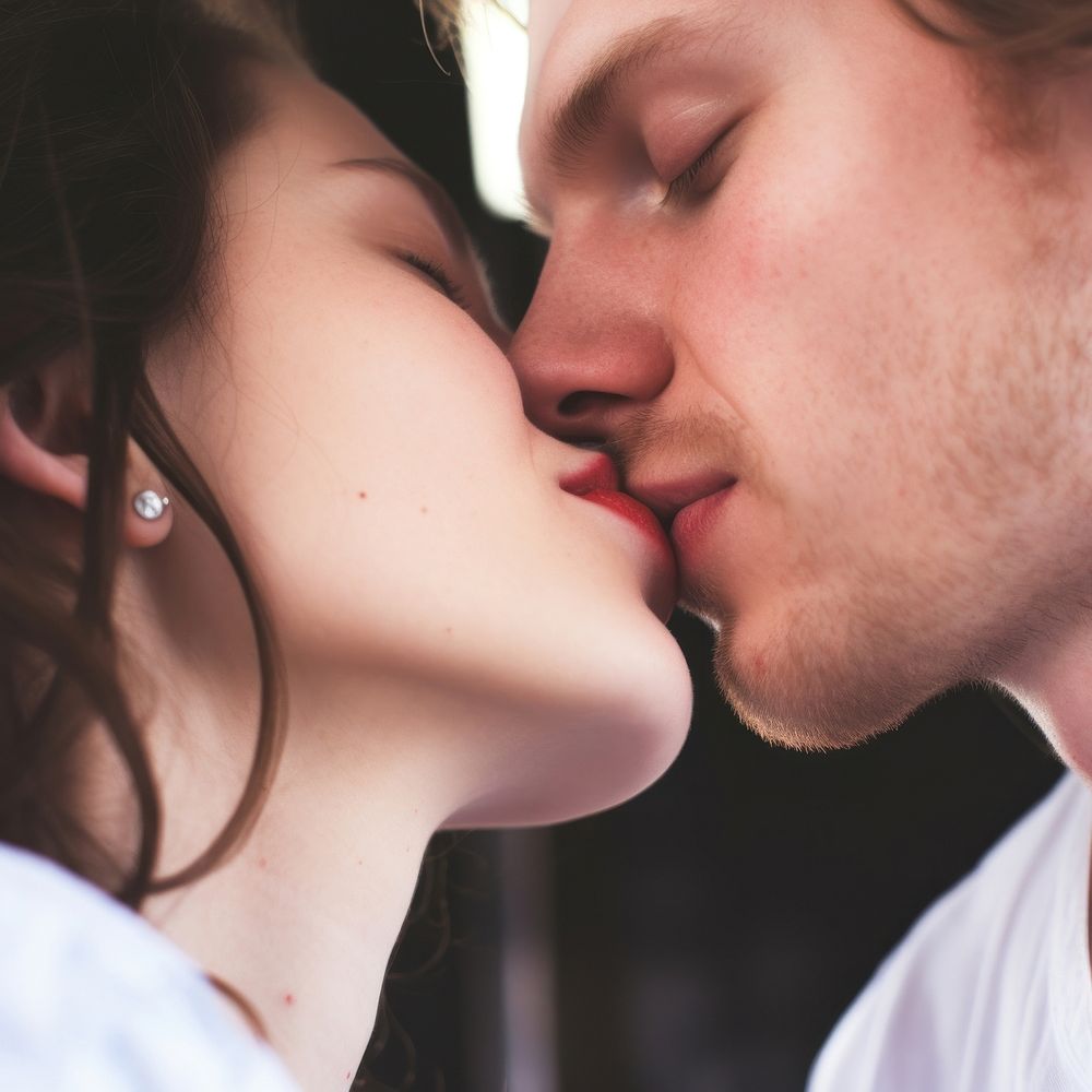 Close up a couple sensual kiss close kissing adult affectionate.