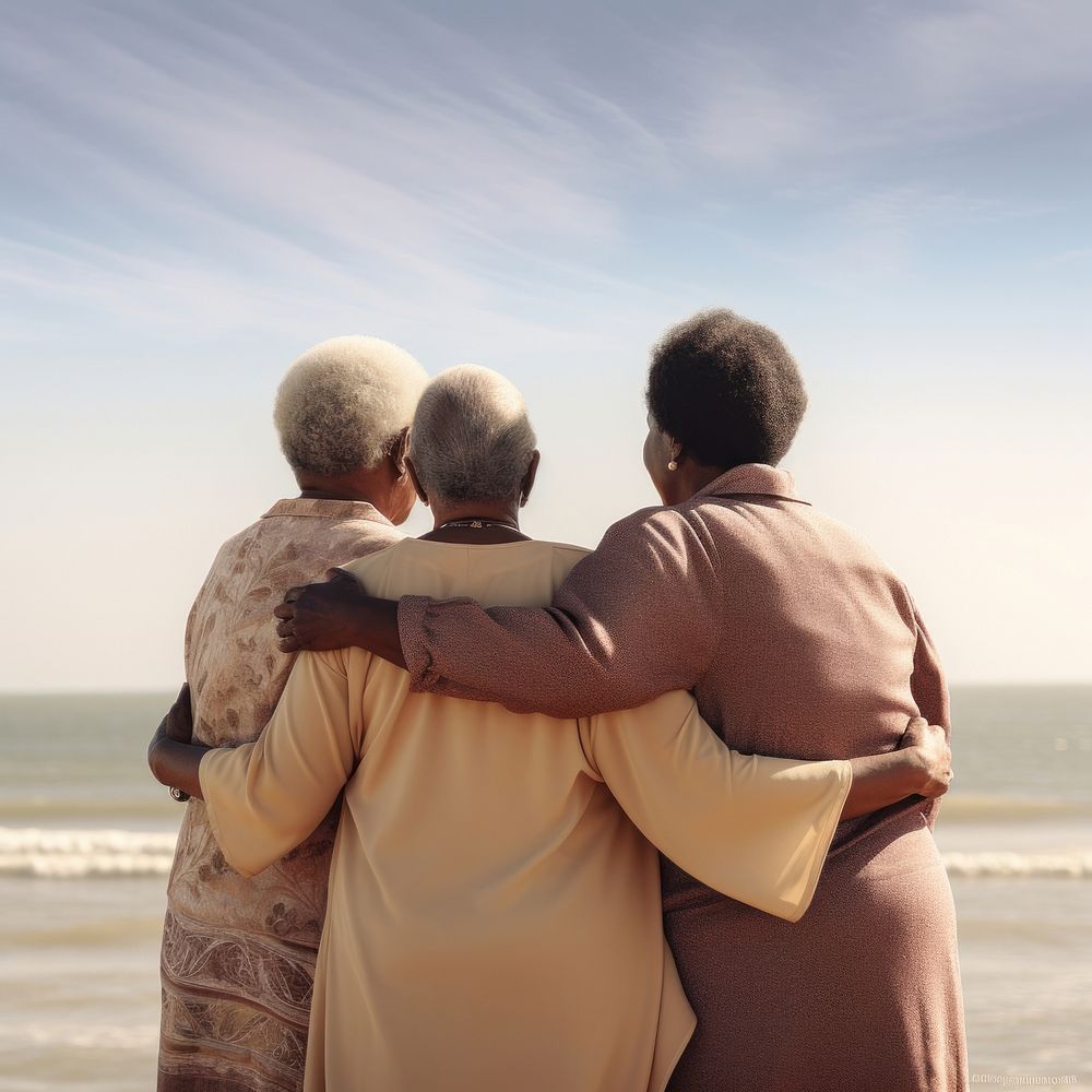 3 friends african-american elderly outdoors hugging adult.