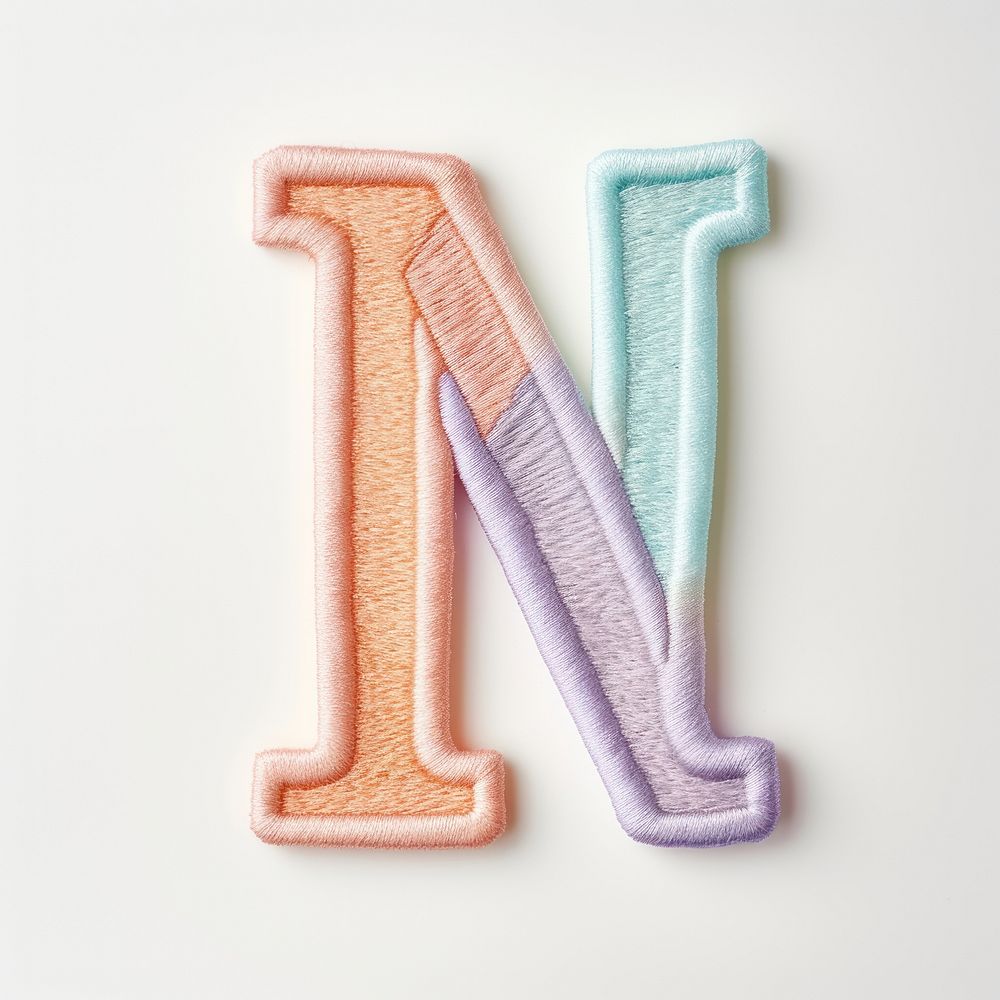 Patch letter M white background creativity textile.