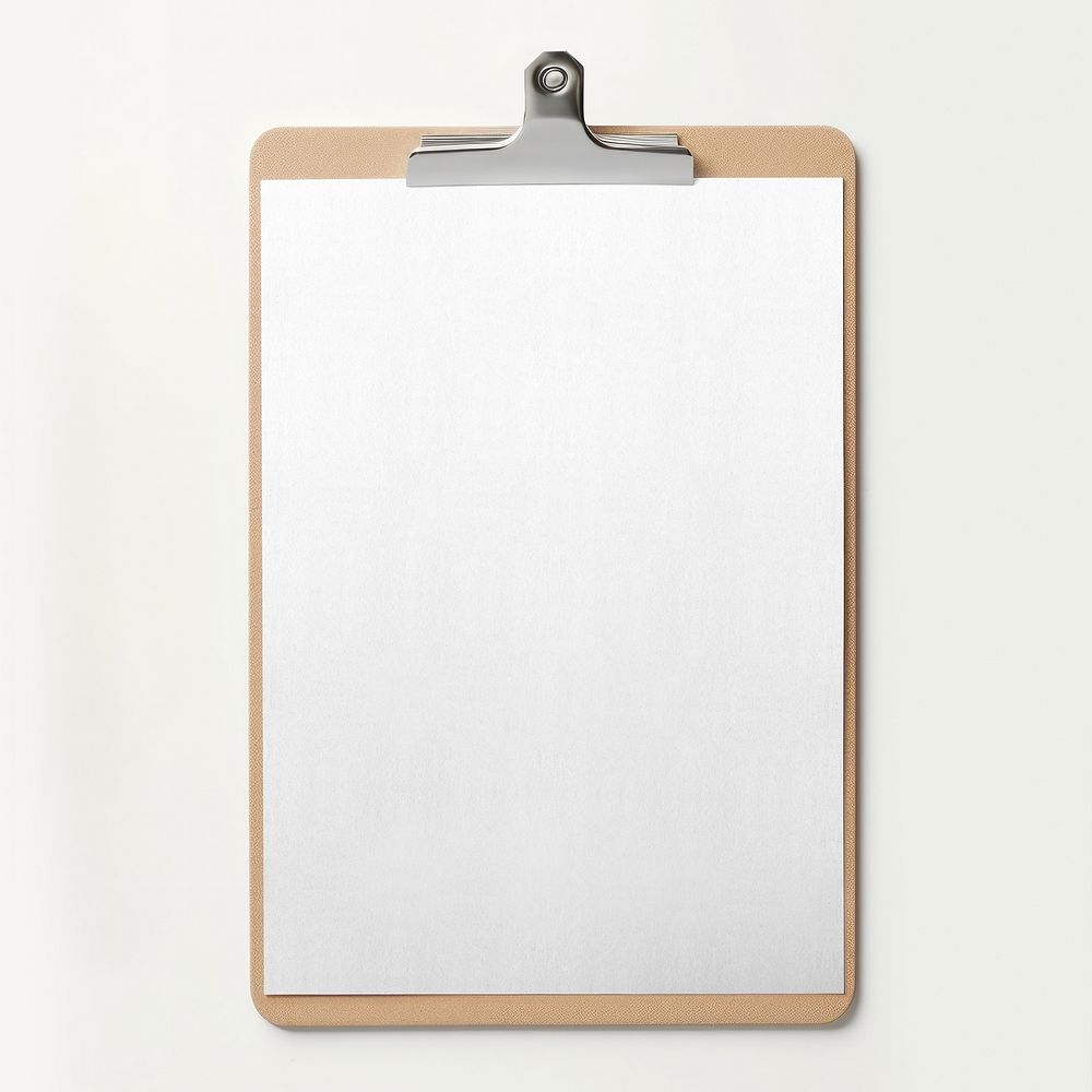 Blank paper on brown clipboard