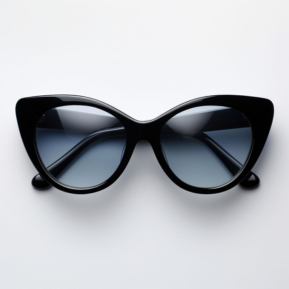 Cat-eye shape black sunglasses white background accessories simplicity.