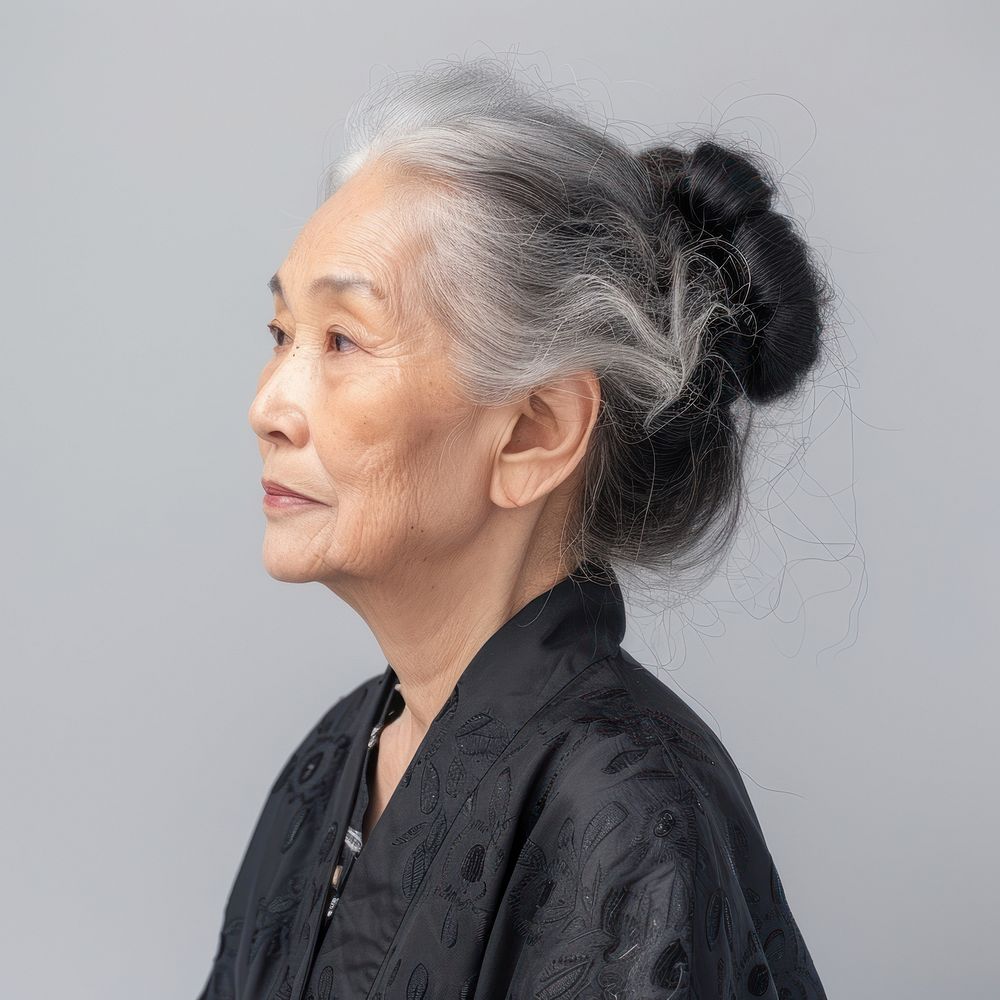 Fashion art studio portrait of asian old woman adult contemplation photography.