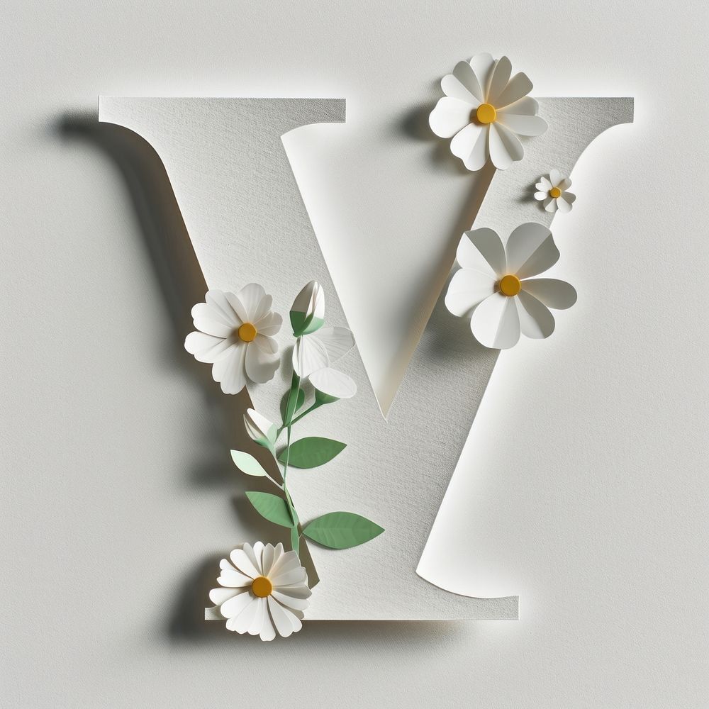 Letter V font flower plant white.