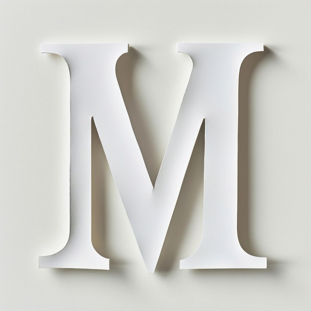 Letter M font alphabet white text.