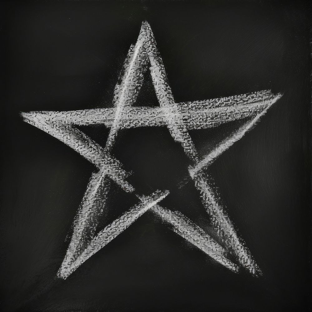 White chalk drawing star texture symbol black black background.