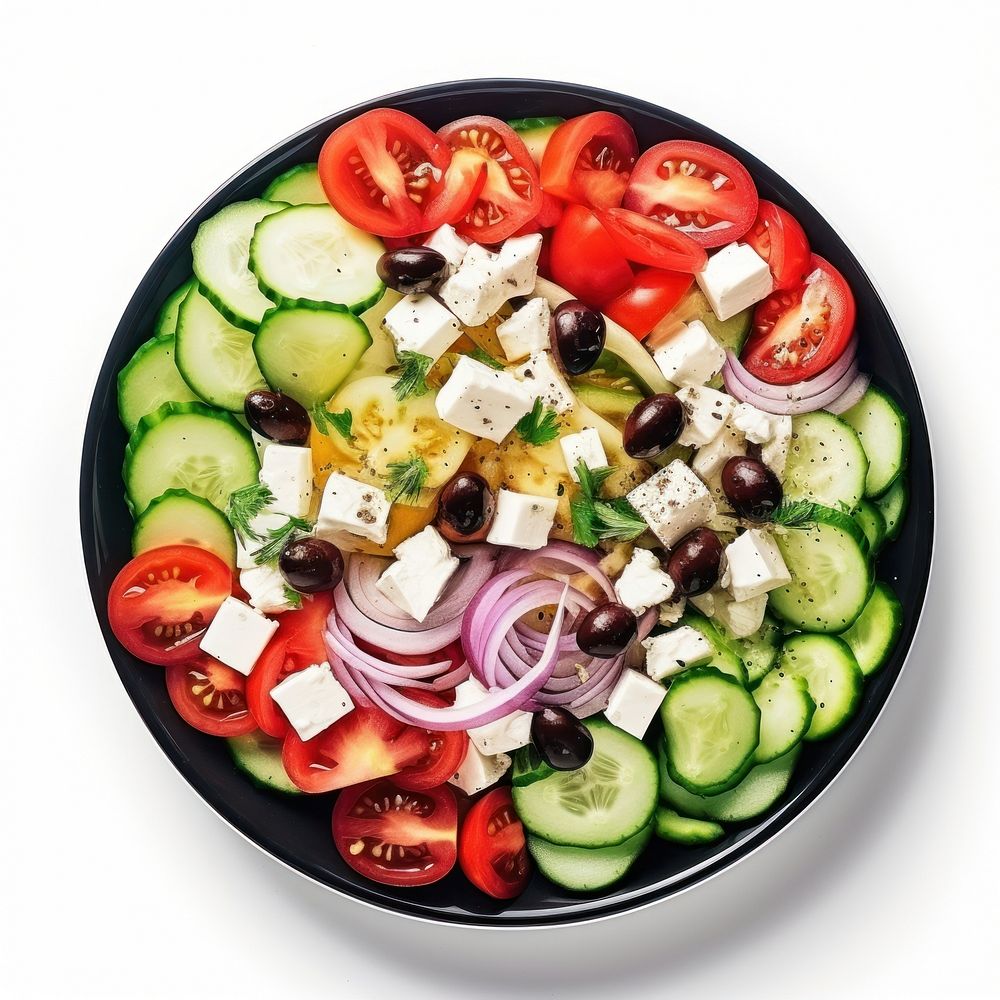Salad with onions and tomatoes with cucumbers and feta cheese lunch plate food.
