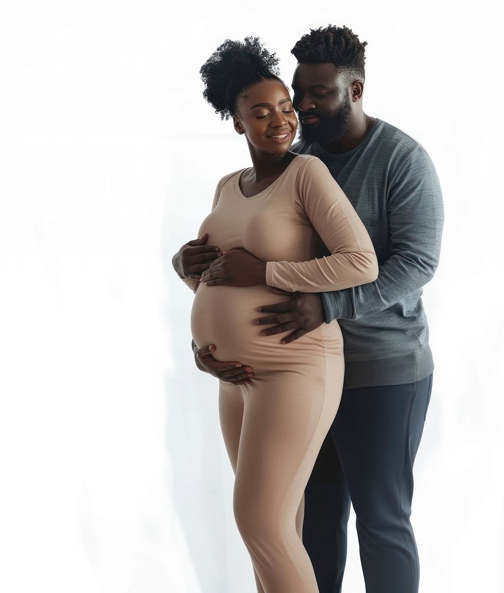 Black man with his pregnant wife portrait hugging adult.