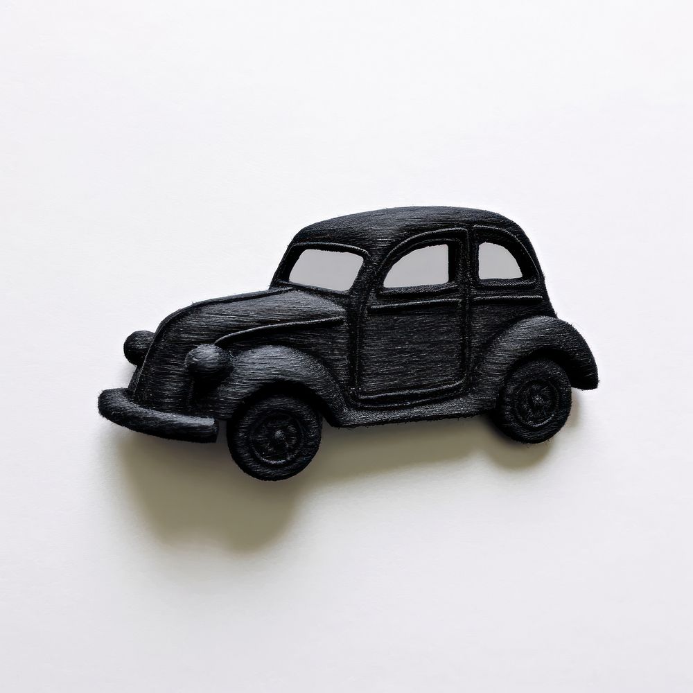 Silkscreen of toy car vehicle wheel black.