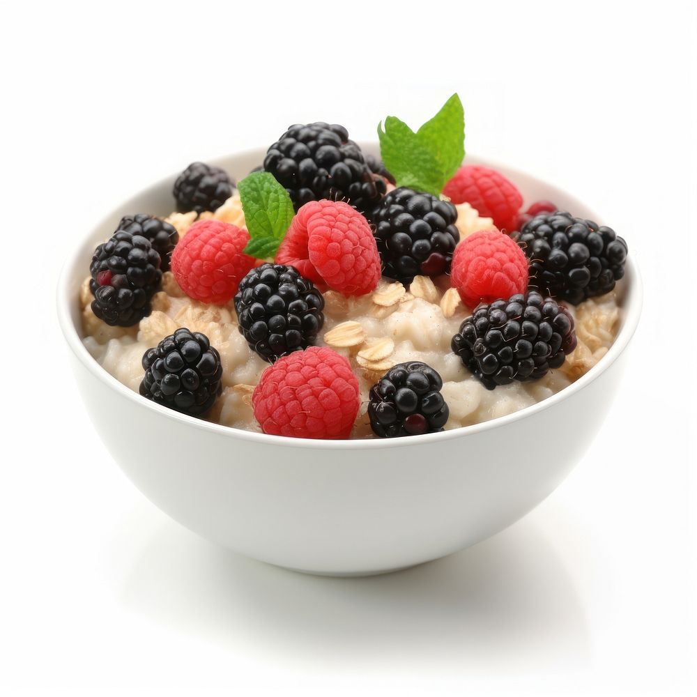 Oatmeal porridge with mix-burry in bowl raspberry fruit plant.