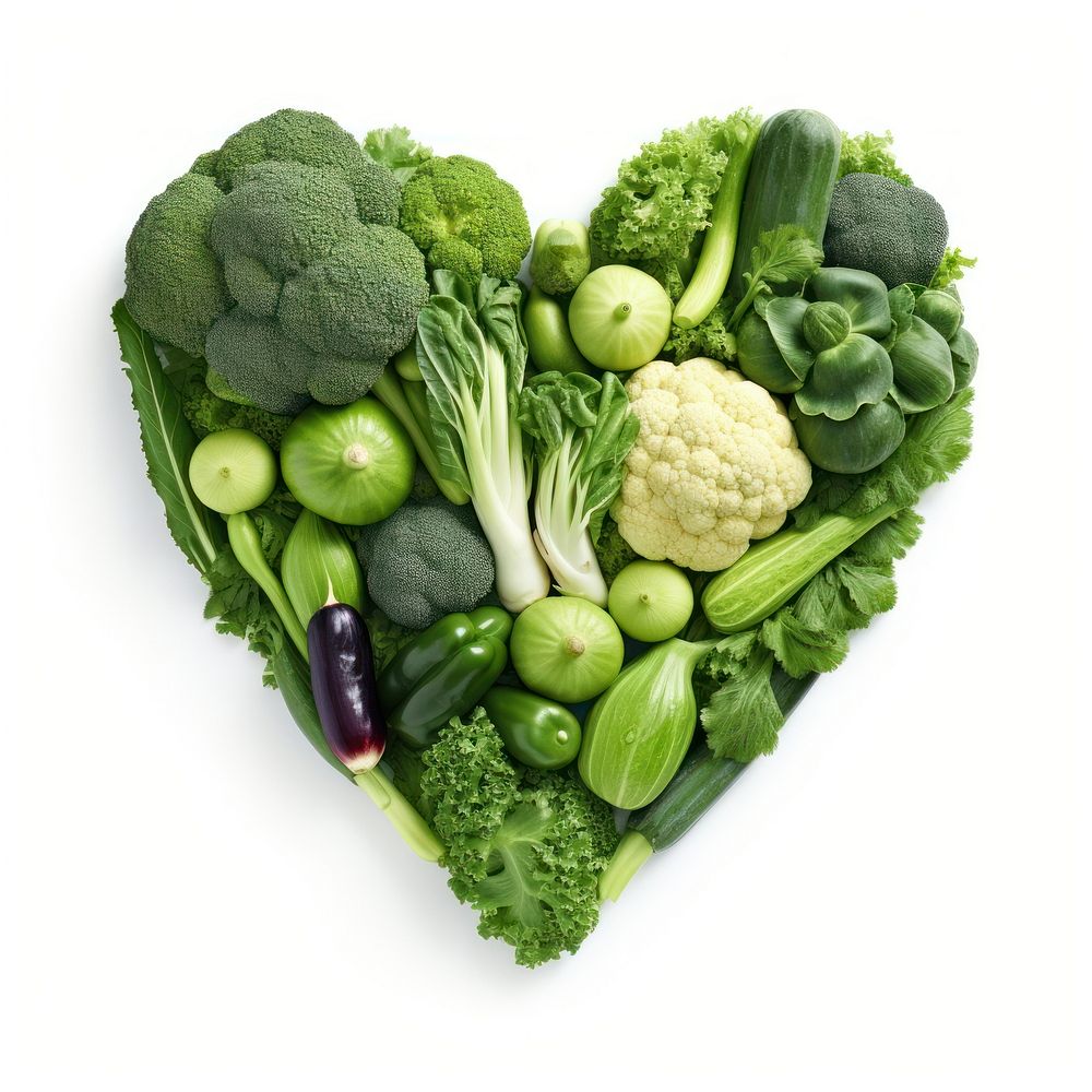 Variety of green vegetables forming heart-shape broccoli plant food.