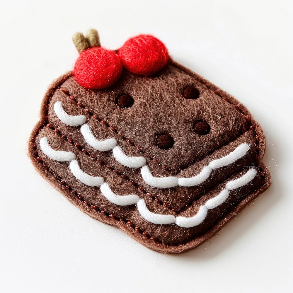 Felt stickers of a single brownie cake confectionery dessert biscuit.