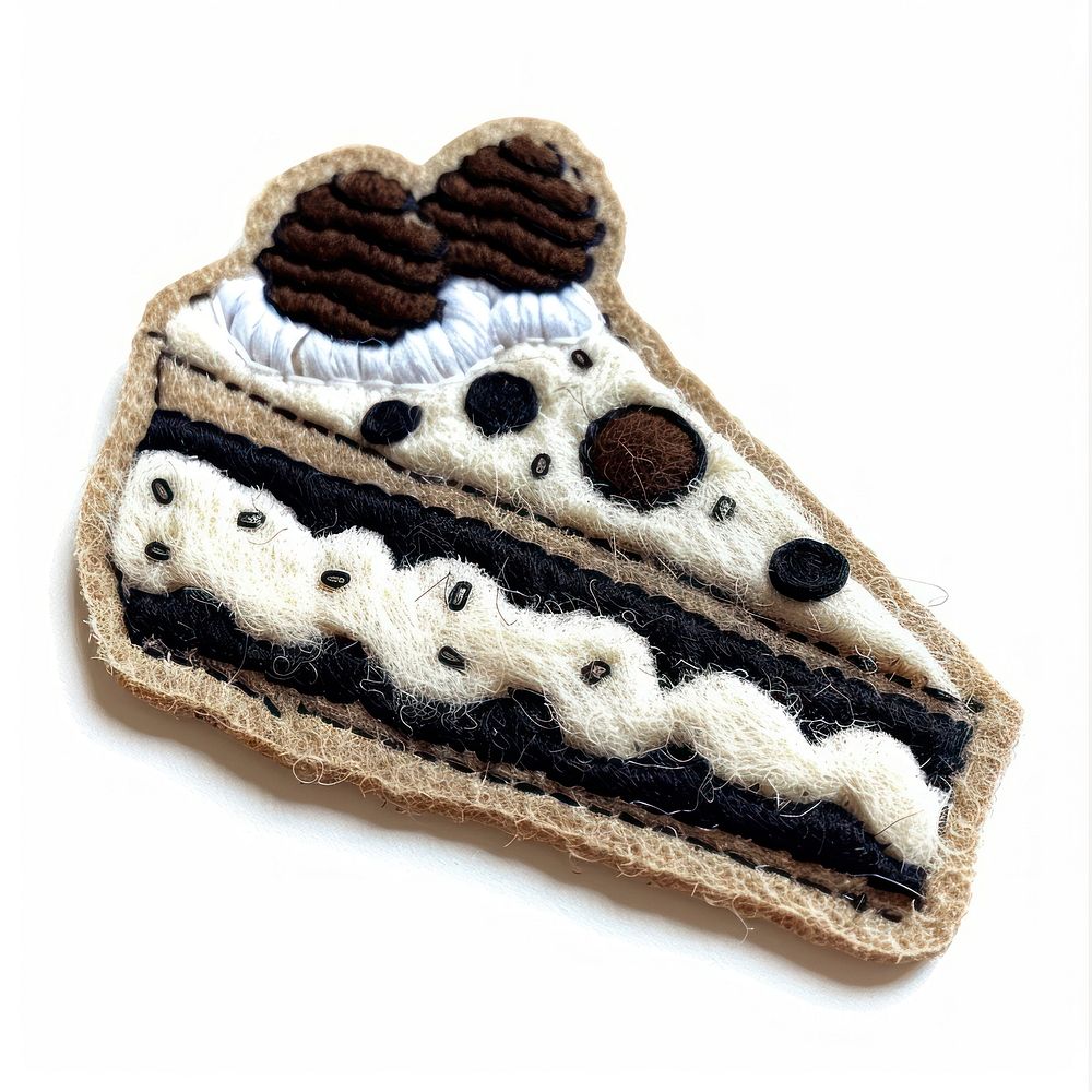 Felt stickers of a single cookie and cream cake confectionery accessories accessory.