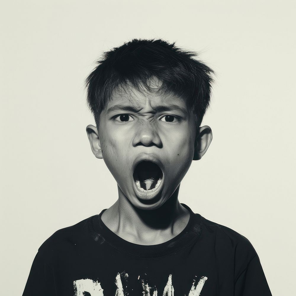 Thai teenage boy yelling face shouting person.