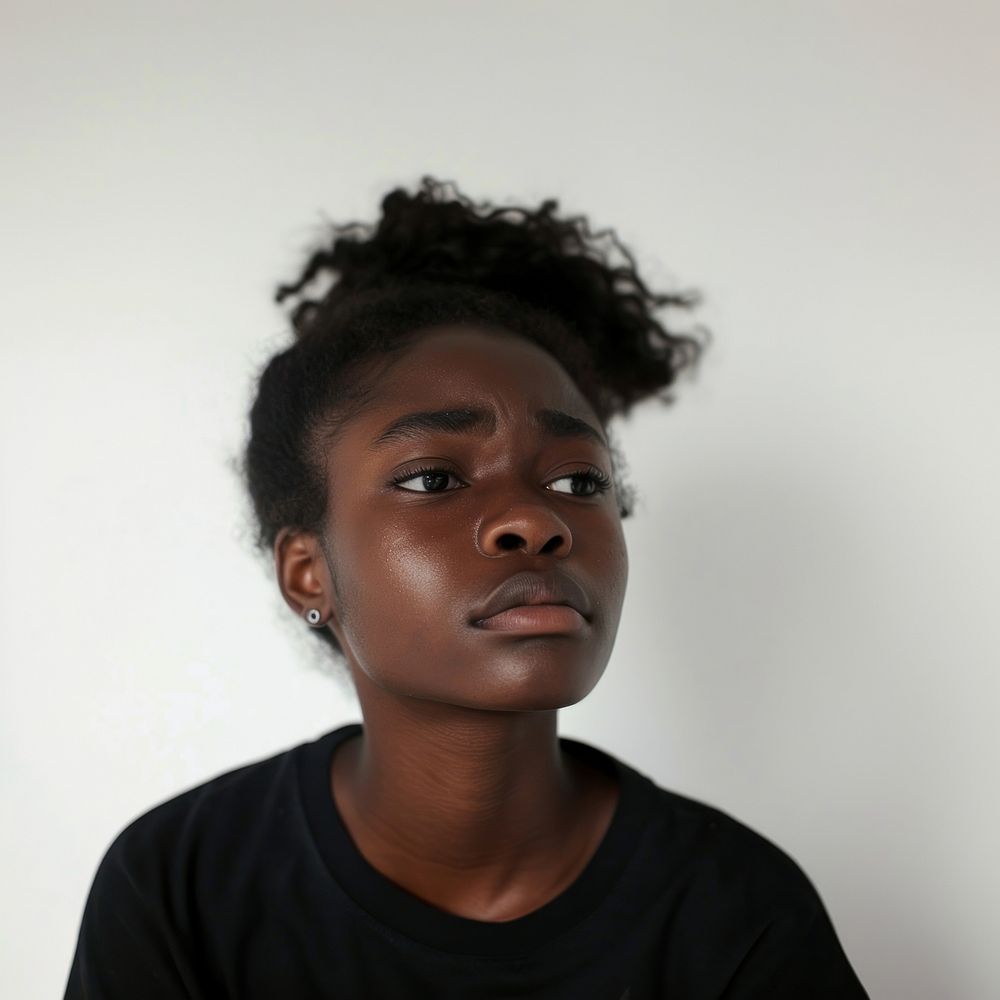 Black teenage girl crying portrait photo face.