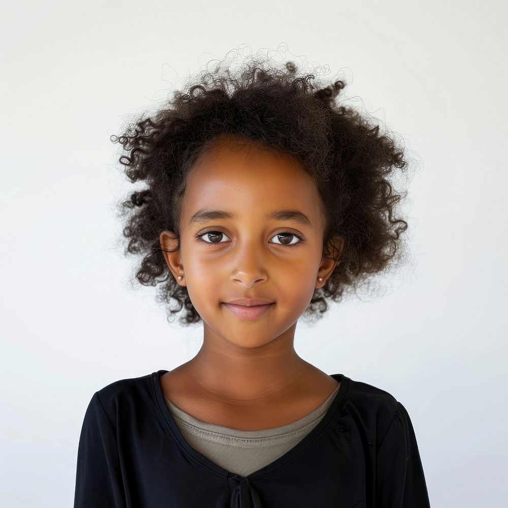 Ethiopian girl kid portrait photo happy.