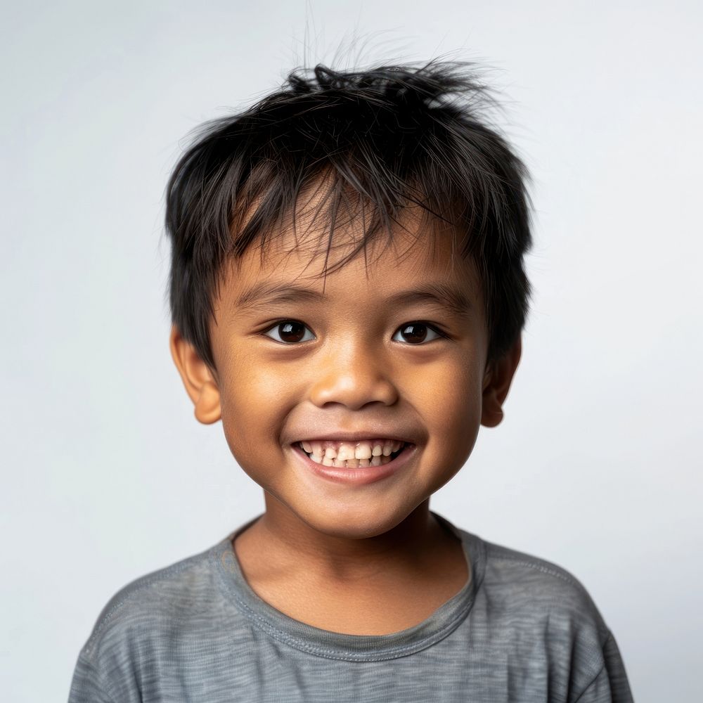 Filipino kid portrait happy photo.
