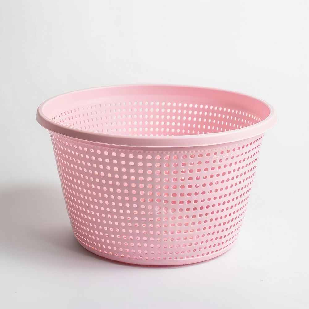Empty pink flexible laundry basket porcelain pottery bowl.