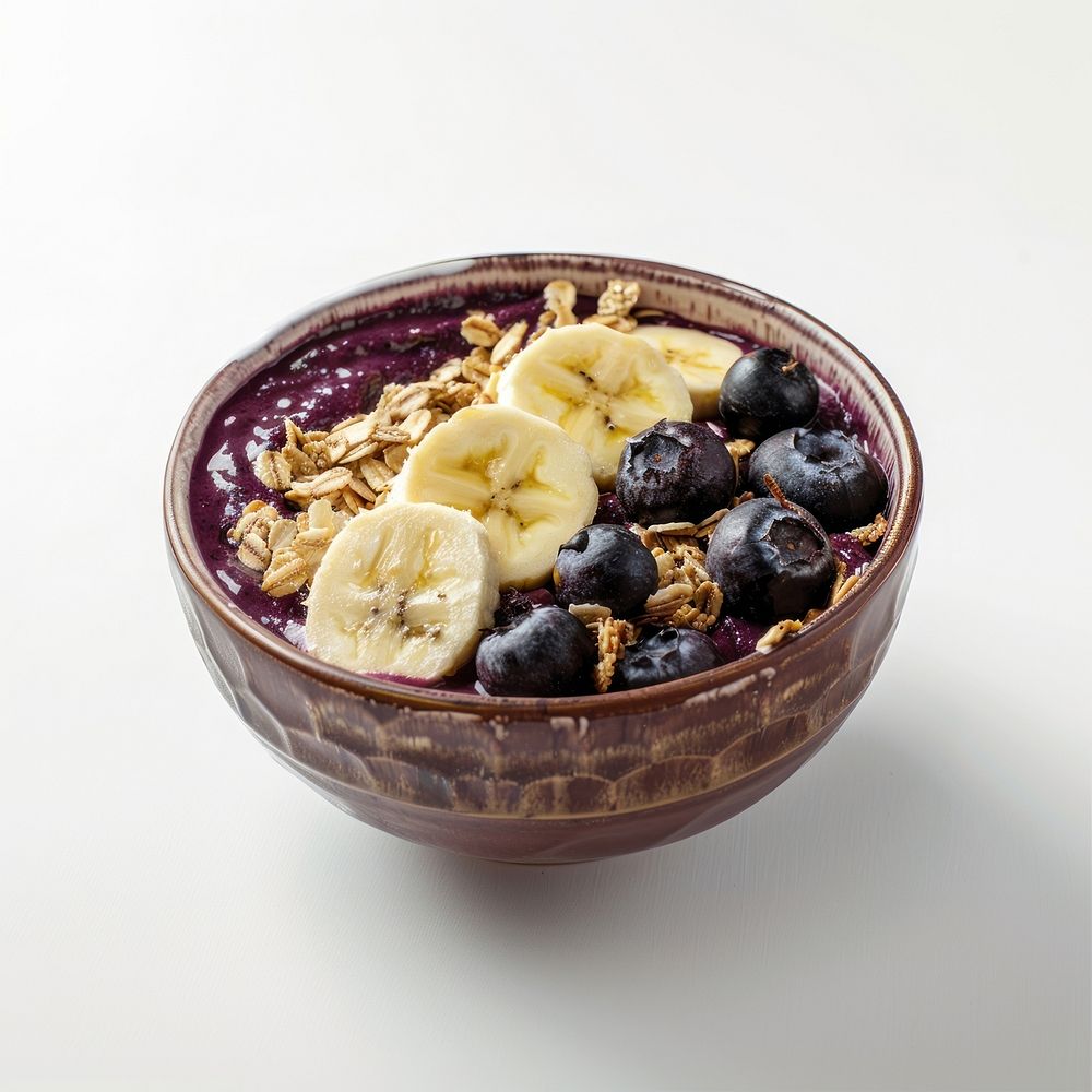 Granola acai bowl blueberry fruit food.