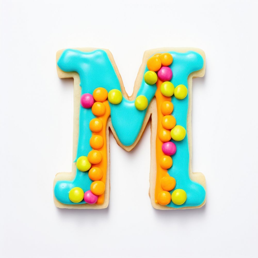 Letter M cookie art confectionery dessert candy.