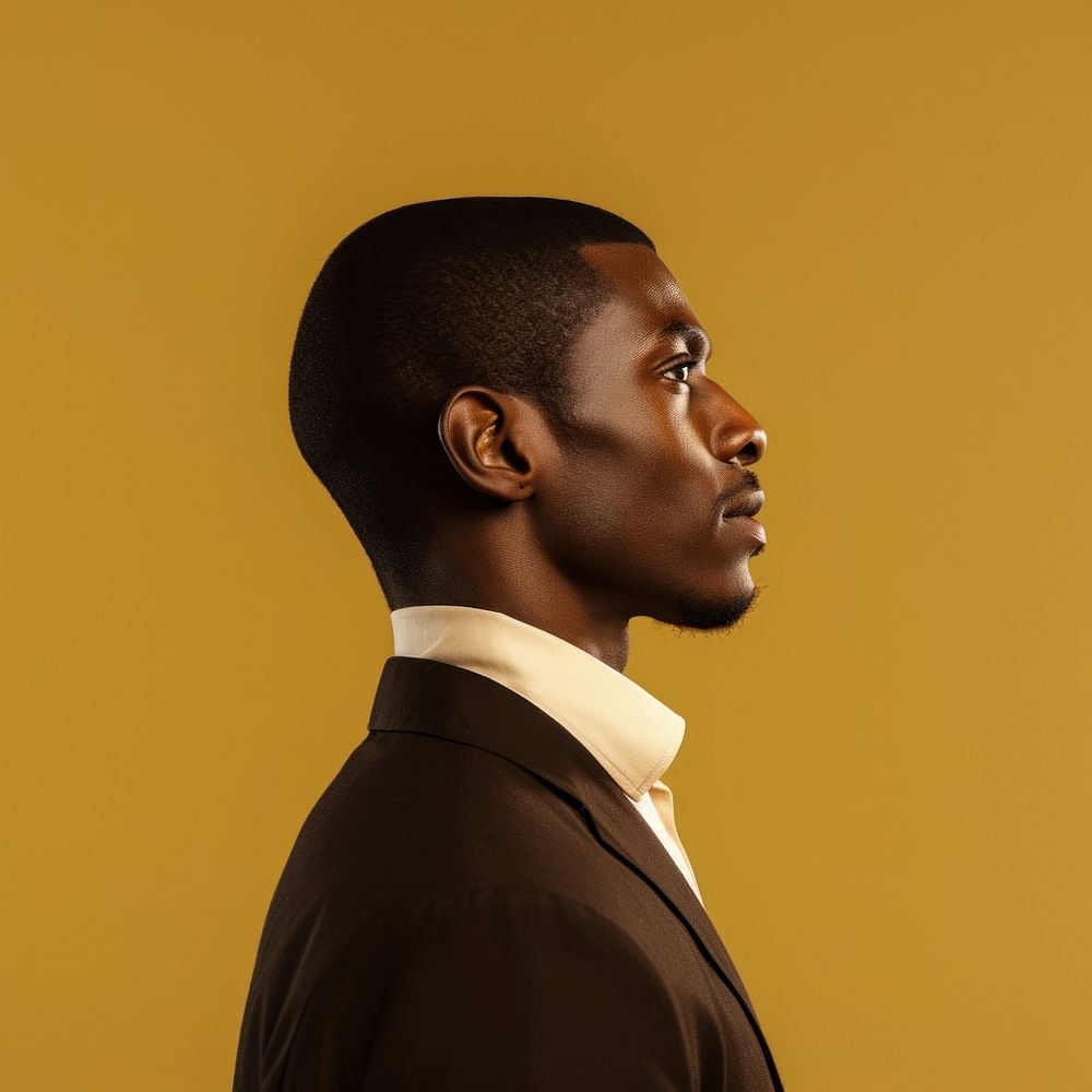 Black man side portrait profile adult photo contemplation.