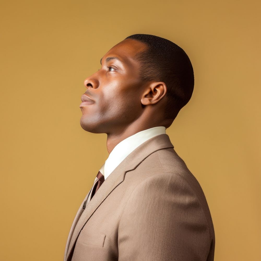 Black businessman side portrait profile adult photo contemplation.