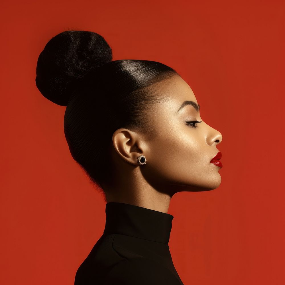 Black woman side portrait profile earring adult photo.